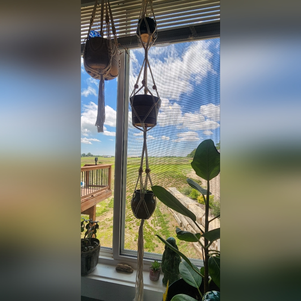 2 New Macrame plant holders for 3 small-medium potted plants. Has accent beads.